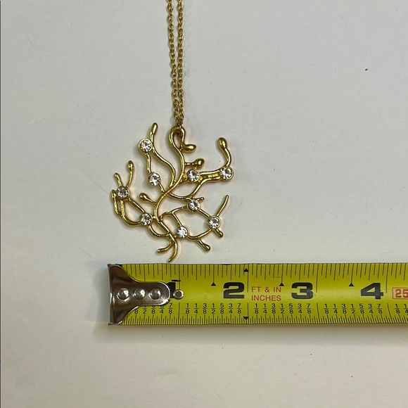 Elegant Gold tone Necklace with Crystal Accents on pendant - Picture 6 of 8